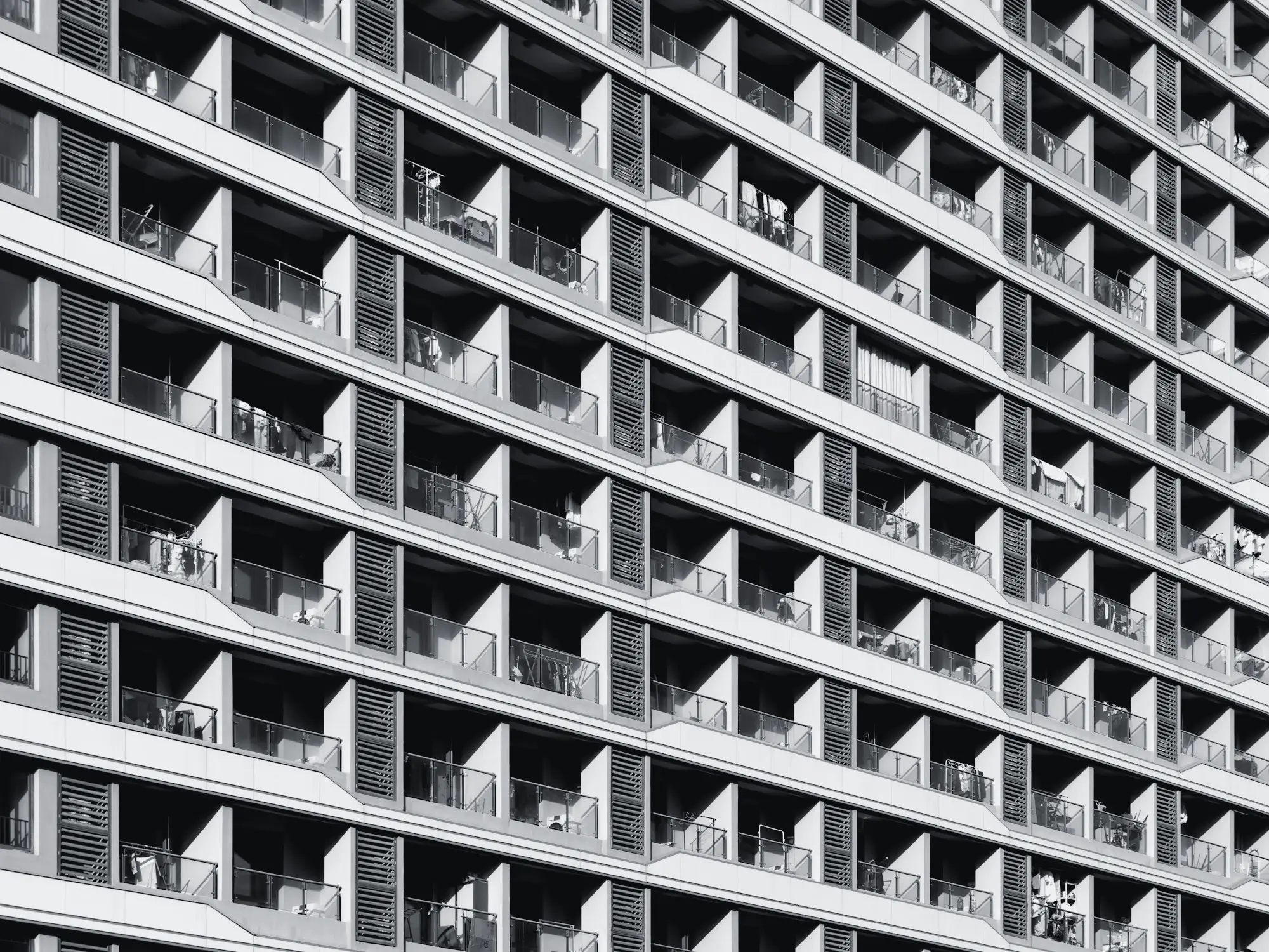 Repeating façade grid of balconies and shutters