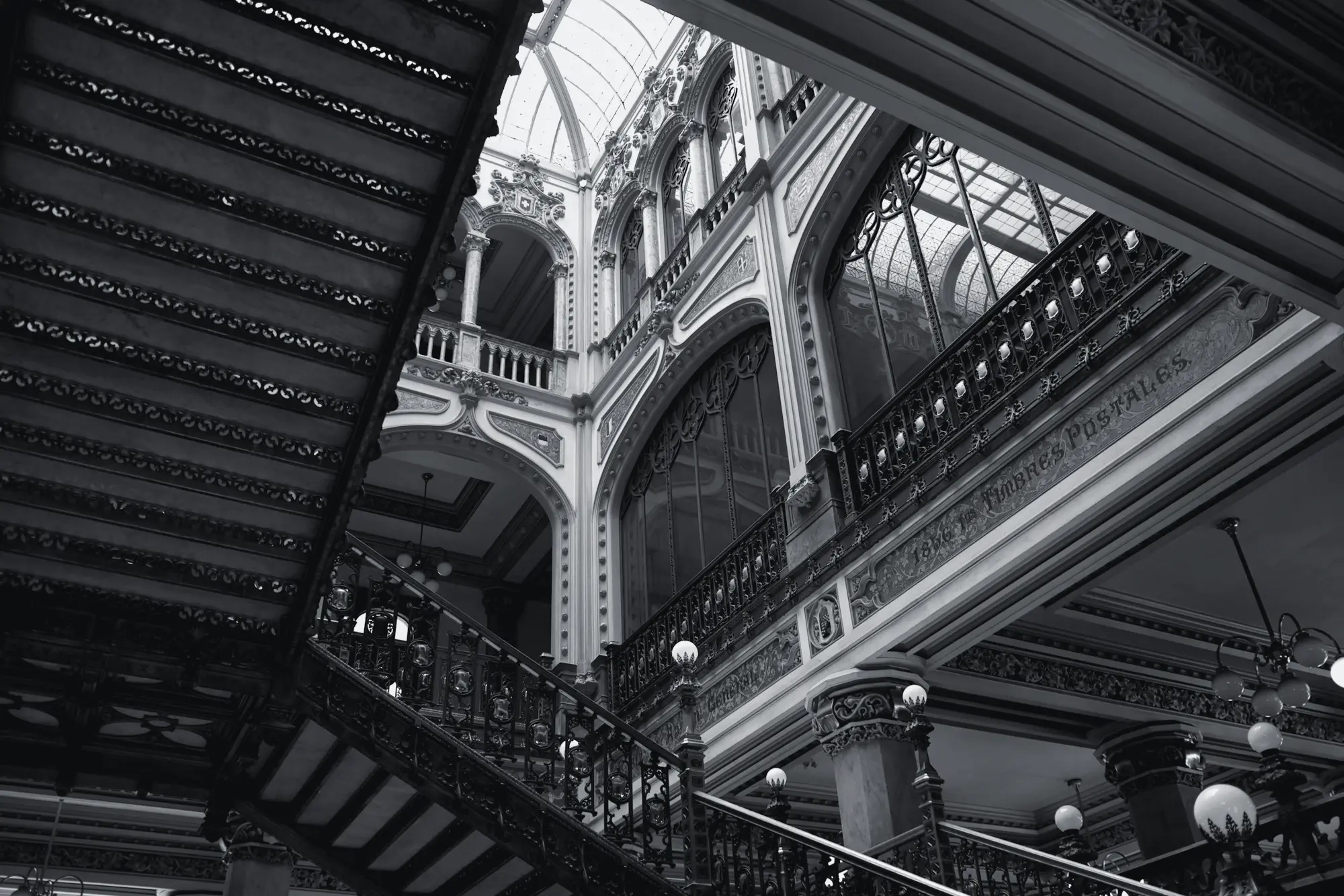 Stairwell with cast-iron railings in a historic hall
